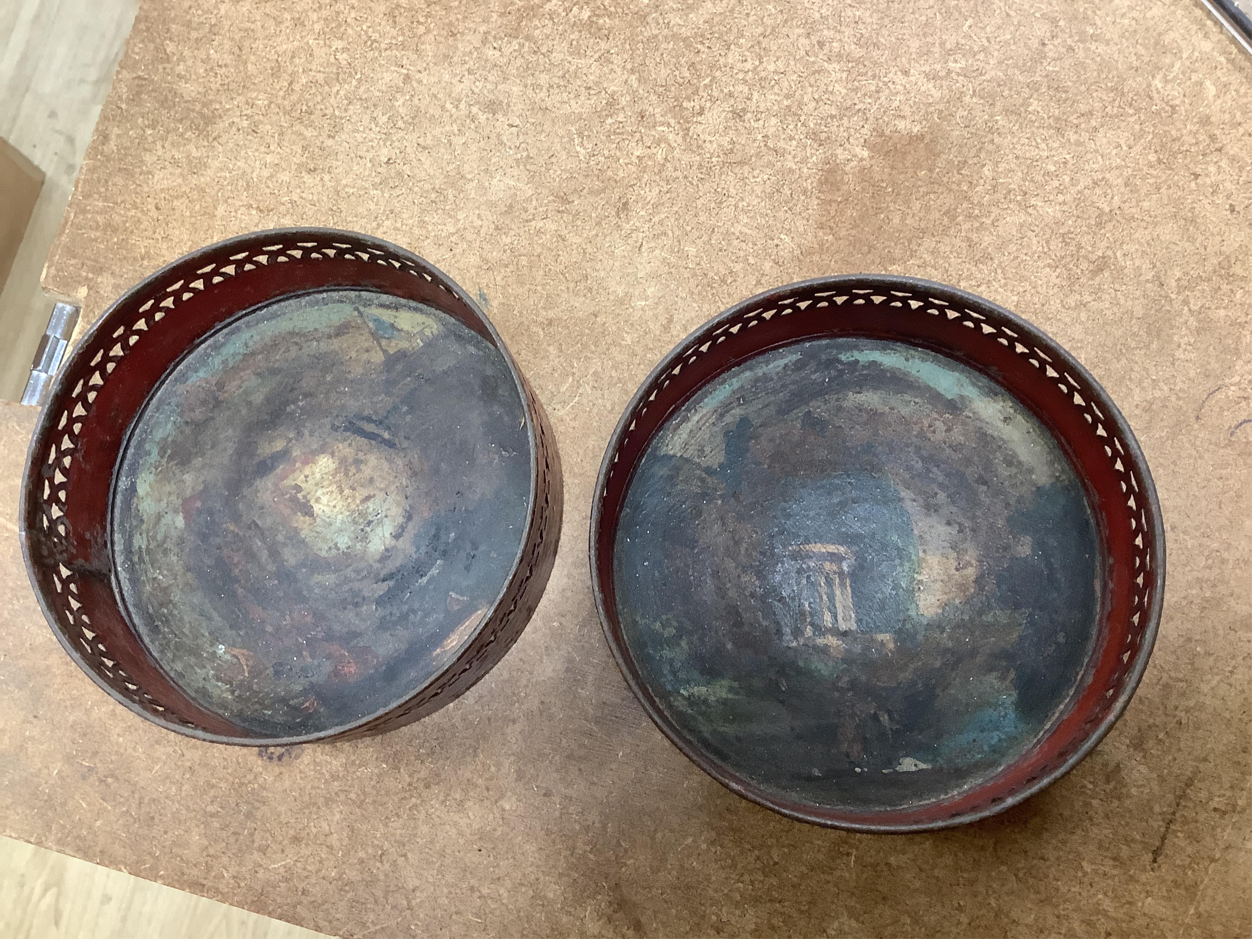 A George III silver and Old Sheffield plate mounted toleware teapot and a pair of red japanned toleware wine coasters, teapot 28cm wide (3)